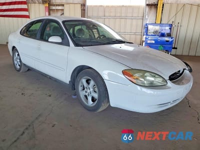 Czwarte zdjęcie samochodu z boku: 2003 FORD TAURUS SES VIN:1FAFP55283A214493 - miniatura