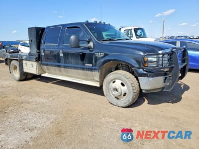 Czwarte zdjęcie samochodu z boku: 2005 FORD F350 SUPER DUTY VIN:1FTWW33P45ED14134 - miniatura