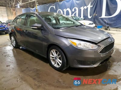 Czwarte zdjęcie samochodu z boku: 2016 FORD FOCUS SE VIN:1FADP3F28GL295516 - miniatura