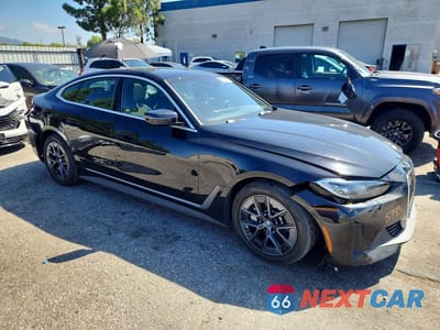 Czwarte zdjęcie samochodu z boku: 2024 BMW I4 EDRIVE 35 VIN:WBY43AW09RFS73131 - miniatura