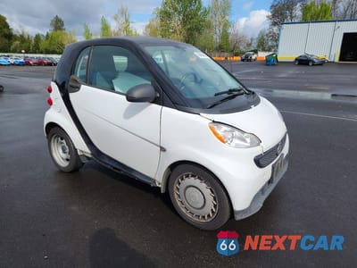 Czwarte zdjęcie samochodu z boku: 2013 SMART FORTWO PURE VIN:WMEEJ3BA9DK680406 - miniatura