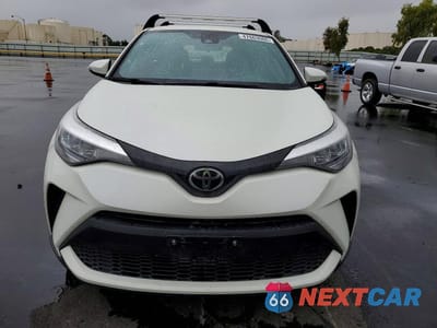 Piąte zdjęcie samochodu w środku: 2021 TOYOTA C-HR XLE VIN:JTNKHMBX1M1115883 - miniatura