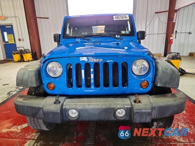 Piąte zdjęcie samochodu w środku: 2011 JEEP WRANGLER SPORT VIN:1J4AA2D15BL531836 - miniatura