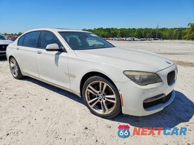 Czwarte zdjęcie samochodu z boku: 2012 BMW 750 LI VIN:WBAKB8C51CDX20572 - miniatura