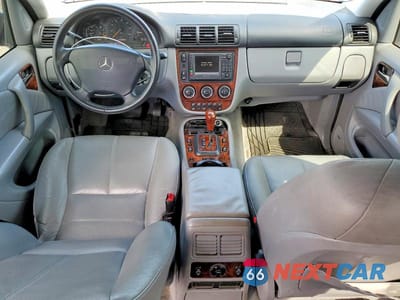 Zdjęcie 8 z 13 samochodu: 2002 MERCEDES-BENZ ML 500 VIN:4JGAB75E92A323547 - miniatura