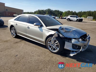 Czwarte zdjęcie samochodu z boku: 2017 AUDI A8 L QUATTRO VIN:WAU44AFD3HN018719 - miniatura