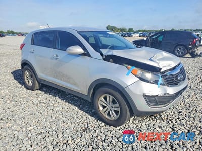 Czwarte zdjęcie samochodu z boku: 2011 KIA SPORTAGE LX VIN:KNDPB3A29B7067393 - miniatura