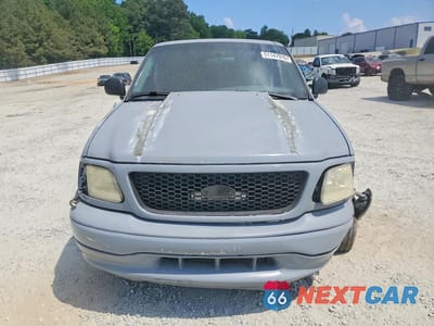 Piąte zdjęcie samochodu w środku: 1999 FORD F150 VIN:1FTZF1725XNA91427 - miniatura
