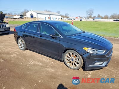 Czwarte zdjęcie samochodu z boku: 2017 FORD FUSION TITANIUM VIN:3FA6P0D93HR273417 - miniatura