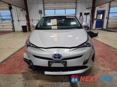 Piąte zdjęcie samochodu w środku: 2016 TOYOTA PRIUS TWO VIN:JTDKBRFU8G3008020 - miniatura