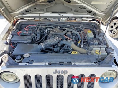 Zdjęcie 12 z 13 samochodu: 2010 JEEP WRANGLER SPORT VIN:1J4AA2D19AL119997 - miniatura