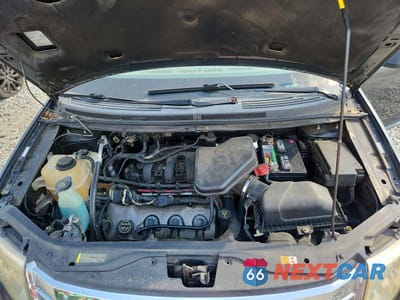 Zdjęcie 12 z 13 samochodu: 2007 FORD EDGE SE VIN:2FMDK36C37BA46442 - miniatura