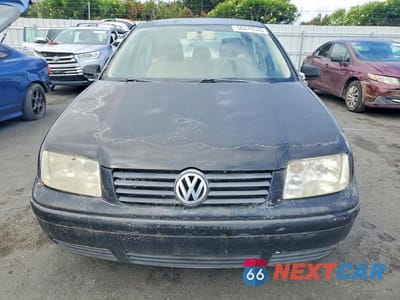 Piąte zdjęcie samochodu w środku: 2000 VOLKSWAGEN JETTA GL VIN:3VWRC29M7YM038945 - miniatura