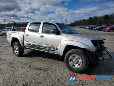 Czwarte zdjęcie samochodu z boku: 2010 TOYOTA TACOMA V6 VIN:3TMLU4EN9AM052318 - miniatura