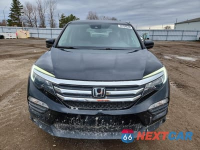 Piąte zdjęcie samochodu w środku: 2017 HONDA PILOT EXL VIN:5FNYF6H67HB090967 - miniatura