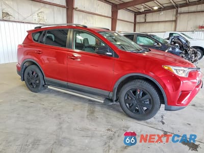 Czwarte zdjęcie samochodu z boku: 2017 TOYOTA RAV4 LE VIN:JTMBFREV9HJ143390 - miniatura
