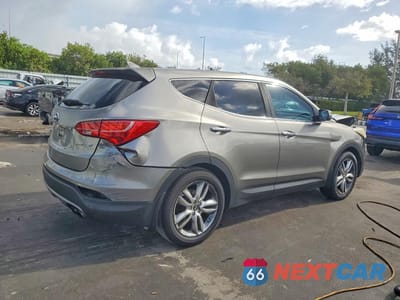 Trzecie zdjęcie samochodu z tyłu: 2013 HYUNDAI SANTA FE SPORT 2.0T VIN:5XYZW3LA4DG065798 - miniatura