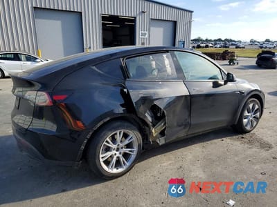 Trzecie zdjęcie samochodu z tyłu: 2023 TESLA MODEL Y VIN:7SAYGAEE7PF863093 - miniatura