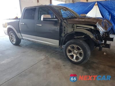 Czwarte zdjęcie samochodu z boku: 2017 RAM 1500 LARAMIE VIN:1C6RR7NTXHS660613 - miniatura