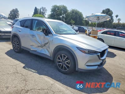 Czwarte zdjęcie samochodu z boku: 2017 MAZDA CX-5 GRAND TOURING VIN:JM3KFBDL0H0217476 - miniatura