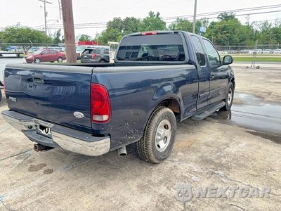 Czwarte zdjęcie samochodu z boku: 2002 FORD F150 VIN:1FTRX17W72NB36764 - miniatura