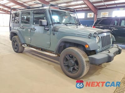 Czwarte zdjęcie samochodu z boku: 2014 JEEP WRANGLER UNLIMITED SPORT VIN:1C4BJWDG2EL118069 - miniatura