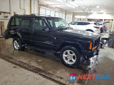 Czwarte zdjęcie samochodu z boku: 2001 JEEP CHEROKEE SPORT VIN:1J4FF48S41L608426 - miniatura