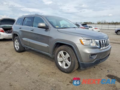 Czwarte zdjęcie samochodu z boku: 2011 JEEP GRAND CHEROKEE LAREDO VIN:1J4RR4GG1BC734827 - miniatura