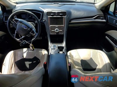 Zdjęcie 8 z 12 samochodu: 2017 FORD FUSION TITANIUM PHEV VIN:3FA6P0SUXHR275799 - miniatura