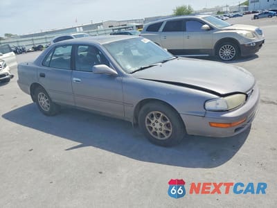 Czwarte zdjęcie samochodu z boku: 1992 TOYOTA CAMRY XLE VIN:4T1SK13E3NU140622 - miniatura