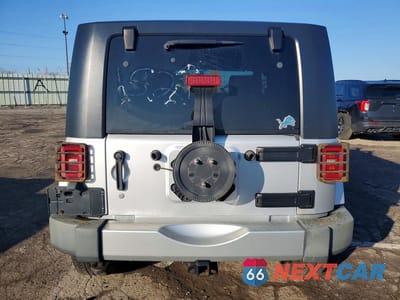 Zdjęcie 6 z 12 samochodu: 2009 JEEP WRANGLER SAHARA VIN:1J4FA54119L701529 - miniatura