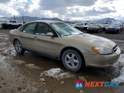 Czwarte zdjęcie samochodu z boku: 2001 FORD TAURUS SES VIN:1FAFP55U21A126182 - miniatura