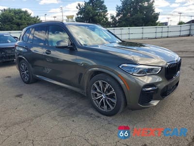 Czwarte zdjęcie samochodu z boku: 2023 BMW X5 XDRIVE45E VIN:5UXTA6C09P9P83302 - miniatura