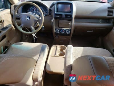 Zdjęcie 8 z 13 samochodu: 2004 HONDA CR-V LX VIN:JHLRD68424C011966 - miniatura