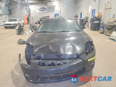 Piąte zdjęcie samochodu w środku: 2012 MITSUBISHI ECLIPSE GT VIN:4A31K3DT9CE601304 - miniatura