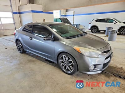 Czwarte zdjęcie samochodu z boku: 2014 KIA FORTE KOUP SX VIN:KNAFZ6A37E5232971 - miniatura