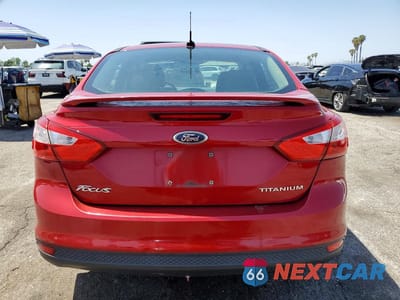 Zdjęcie 6 z 12 samochodu: 2012 FORD FOCUS TITANIUM VIN:1FAHP3J22CL429441 - miniatura