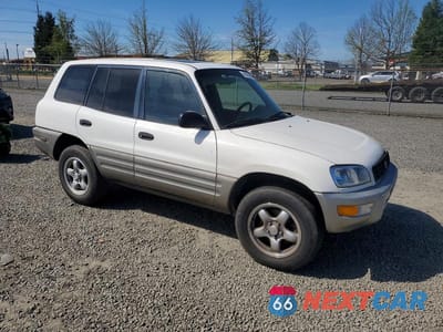 Czwarte zdjęcie samochodu z boku: 1998 TOYOTA RAV4 BASE VIN:JT3HP10VXW0188555 - miniatura