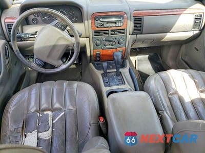 Zdjęcie 8 z 13 samochodu: 1999 JEEP GRAND CHEROKEE LIMITED VIN:1J4GW68N2XC677361 - miniatura