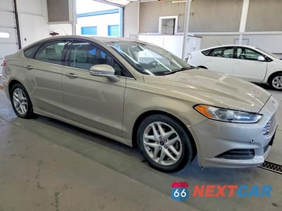 Czwarte zdjęcie samochodu z boku: 2015 FORD FUSION SE VIN:3FA6P0H70FR202987 - miniatura