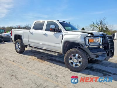 Czwarte zdjęcie samochodu z boku: 2017 GMC SIERRA K2500 SLT VIN:1GT12TEG3HF121149 - miniatura