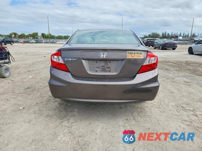 Zdjęcie 6 z 11 samochodu: 2012 HONDA CIVIC LX VIN:19XFB2F59CE013649 - miniatura