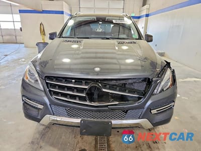Piąte zdjęcie samochodu w środku: 2015 MERCEDES-BENZ ML 350 4MATIC VIN:4JGDA5HB1FA596963 - miniatura