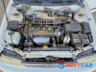 Zdjęcie 11 z 12 samochodu: 1995 TOYOTA COROLLA DX VIN:1NXAE09B0SZ312417 - miniatura