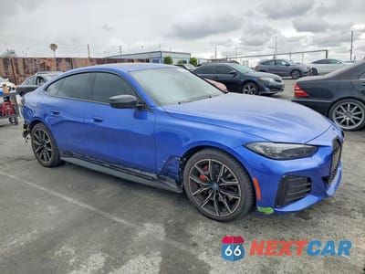 Czwarte zdjęcie samochodu z boku: 2023 BMW I4 EDRIVE 40 VIN:WBY73AW08PFR16465 - miniatura