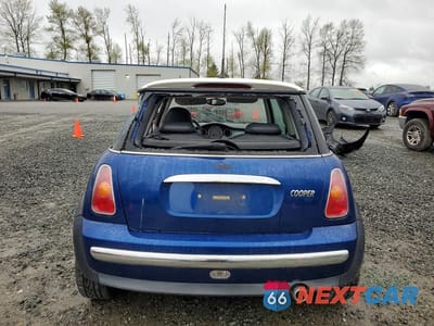 Zdjęcie 6 z 13 samochodu: 2002 MINI COOPER VIN:WMWRC33462TC32585 - miniatura