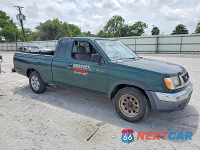 Czwarte zdjęcie samochodu z boku: 2000 NISSAN FRONTIER XE VIN:1N6DD26S7YC334396 - miniatura