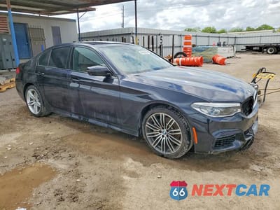 Czwarte zdjęcie samochodu z boku: 2019 BMW 530E VIN:WBAJA9C55KB392930 - miniatura