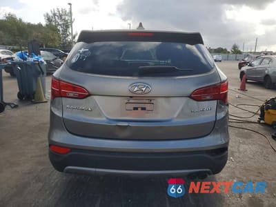 Zdjęcie 6 z 13 samochodu: 2013 HYUNDAI SANTA FE SPORT 2.0T VIN:5XYZW3LA4DG065798 - miniatura