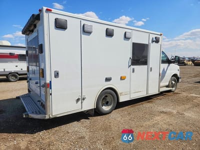 Trzecie zdjęcie samochodu z tyłu: 2015 CHEV EXPRESS G3500 VIN:1GB3G3CG0F1110556 - miniatura